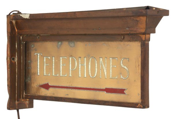 Light Up Telephone Directional Sign: Light Up Telephone Directional Sign. Wonderful wall mounted double sided copper framed sign with overhanging cornice top and 2 socket lighting fixture in the top; has opposite facing reverse decorated