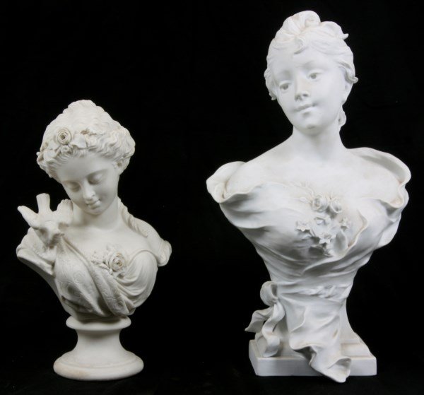 2 Figural Parian Busts: 2 Figural Parian Busts. 1) 15 in. tall bust of a young girl signed S. (Sylvain) Kinsburger, in excellent condition with no breaks, chips or repairs. 2) 11.5 in. tall bust of a young girl with a dove o