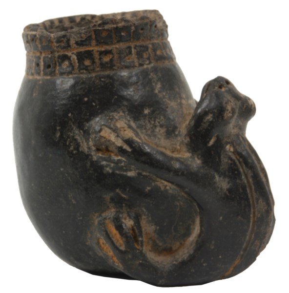 Peruvian Black Pottery Frog Vase: Peruvian Black Pottery Frog Vase. Has a lemon form with 2 row geometric border around the rim and a large figural frog applied to the side. Has a very dark brown-black finish, no visible hairlines, ha