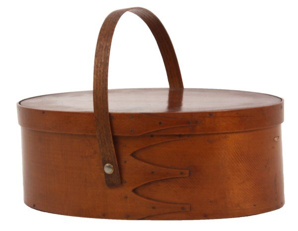 Lg. Oval Shaker Sewing Box w/ Handle: Lg. Oval Shaker Sewing Box w/ Handle. Oval box has lid and hinged handle, lapped 3 finger construction with wool padded and silk lined interior with ribbons; has wear to the lining, handle is replaced