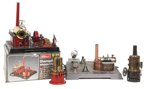 4 Tin Toy Steam Boilers: 4 Tin Toy Steam Boilers. 1) Excellent in original box, Wiesco Model D21 horizontal steam engine; appears complete, box measures 7.5 in. high x 14 in. wide x 11.5 in. deep. 2) Weeden Steam Toys, Big Gi