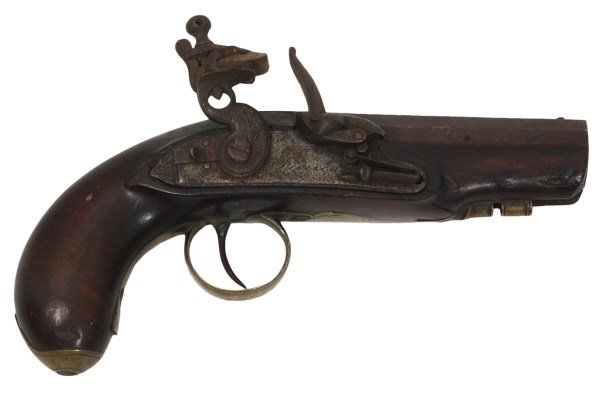 English Large Caliber Flintlock Pistol: English Large Caliber Flintlock Pistol. 4.5 in. octagonal barrel, smooth bore measuring approximately 19.5mm, carved walnut full stock and grip, brass ramrod sleeve, butt plate and trigger guard, iron