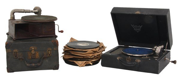 2 Portable Phonographs: 2 Portable Phonographs. 1) The Lynn Phonograph Company portable phonograph in a case. Iron frame with built in speaker, has original red paint with lined stenciling and reads "The Lynn - Lynn Phonogra