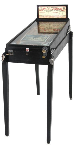 Rockola Worlds Fair Jigsaw Pinball Machine: Rockola Worlds Fair Jigsaw Pinball Machine. 1 cent coin operated floor model arcade pinball game in an ebonized wood case with wood legs; has key & coin box, in working condition, ball loading plunger
