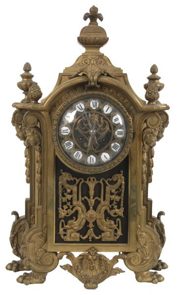 French Bronze Mantle Clock: French Bronze Mantle Clock. 5 in. pierced brass dial overlaid on a ebonized wood back, has black Roman hour numerals on porcelain inserts and silvered hands; brass 8 day spring driven movement signed 