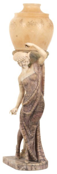 Figural Carved Alabaster Lamp: Figural Carved Alabaster Lamp. Standing figure of a castanet dancer wearing elegant deco garments and a feathered headdress, she stands in front of the lamp post over her left shoulder with a turned c