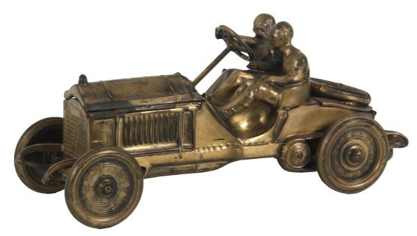 Excellent Gilt Metal Automobile Inkwell: Excellent Gilt Metal Automobile Inkwell. Spelter casting of a racecar No. 7 with 2 drivers, has 2 cobalt glass ink inserts under the hood and an open compartment in the trunk under the spare tire; has