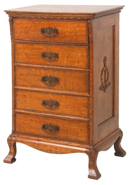 Hawthorne & Sheble Music Cabinet: Hawthorne & Sheble Oak 5 Drawer Music Cabinet. 5 drawers bordered with carved rope twist trim with pierced brass pulls, has wreath & torch carvings on the side panels and stands on fancy carved legs; 