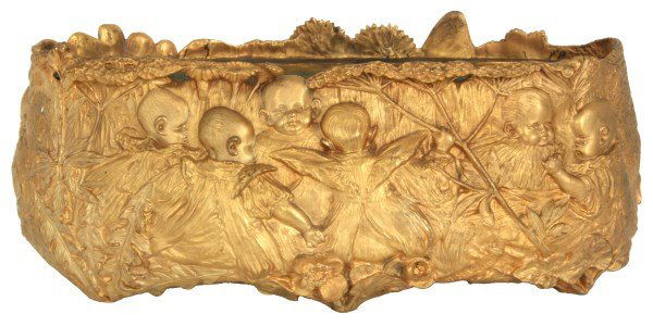 Dore Bronze Deco Figural Fernery: Signed H. St. Lerche (Hans Stoltenberg Lerche) relief decorated bronze planter with 9 figures of children, a large butterfly, full foliage and blooming flowers along the top edge, has a brass liner in