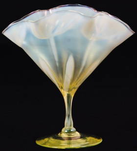 John Walsh Walsh Floriform Fan Vase: John Walsh Walsh Floriform Fan Vase. Translucent yellow stemware vase with a fan shaped top, the wavy rim having 6 points with opaque flowers and stems blossoming into the lobed areas. In excellent co