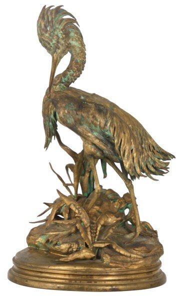 Bronze Moigniez Egret Sculpture: Bronze Jules Moigniez (1835-1894, France) gilt bronze sculpture of an egret standing along a marshy shoreline, signed “Moigniez”. Nice condition, no breaks or repairs, has fine details in the feat