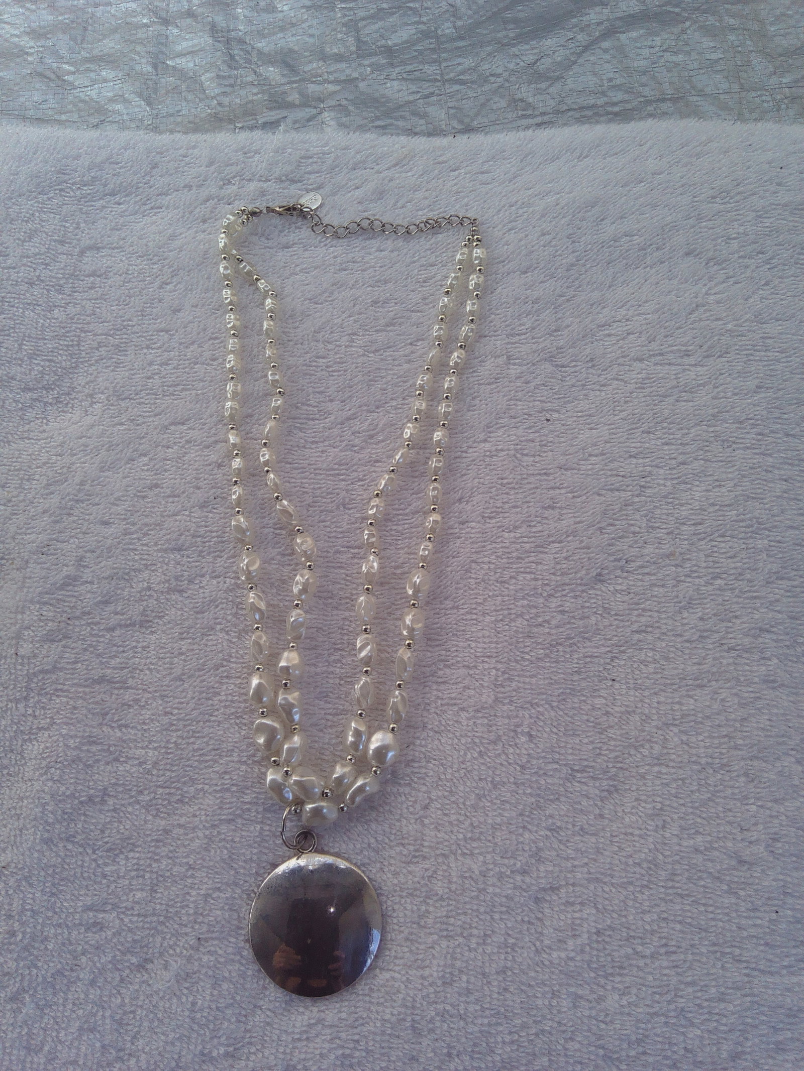 Jill's Coins and Collectibles - Vintage and Antique Jewelry Treasures: This is a Beautiful Two-Strand White beaded Necklace with a round metal pendant.The beads " Coin Pearls" and are considered Good Fortune. By Iceing.