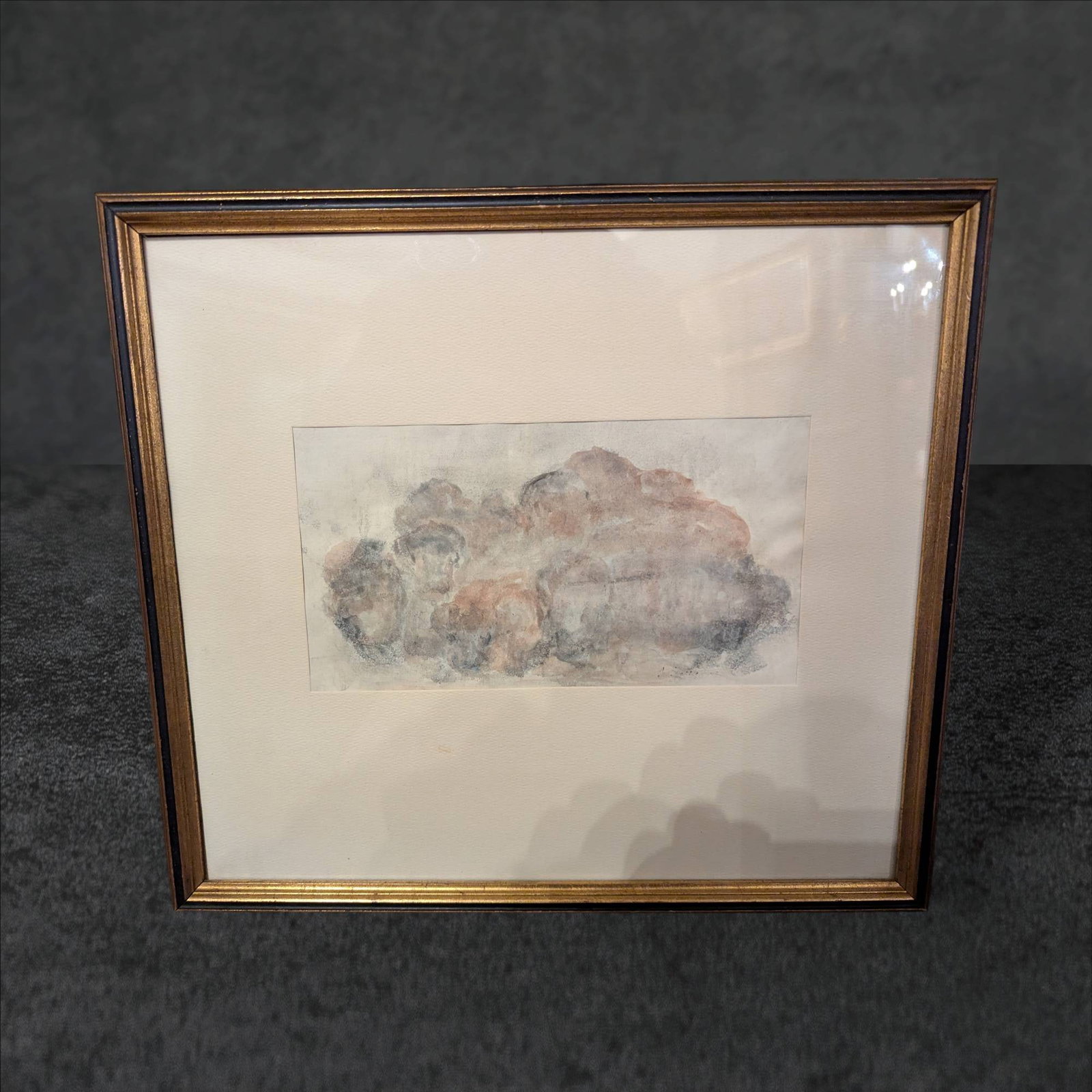 Framed Abstract Watercolor on Paper with Faded Signature: Abstract watercolor painting on paper, framed under glass. The artwork measures approximately 16 3/4 inches by 15 inches. A signature is present but partially faded and unreadable. The piece is displa