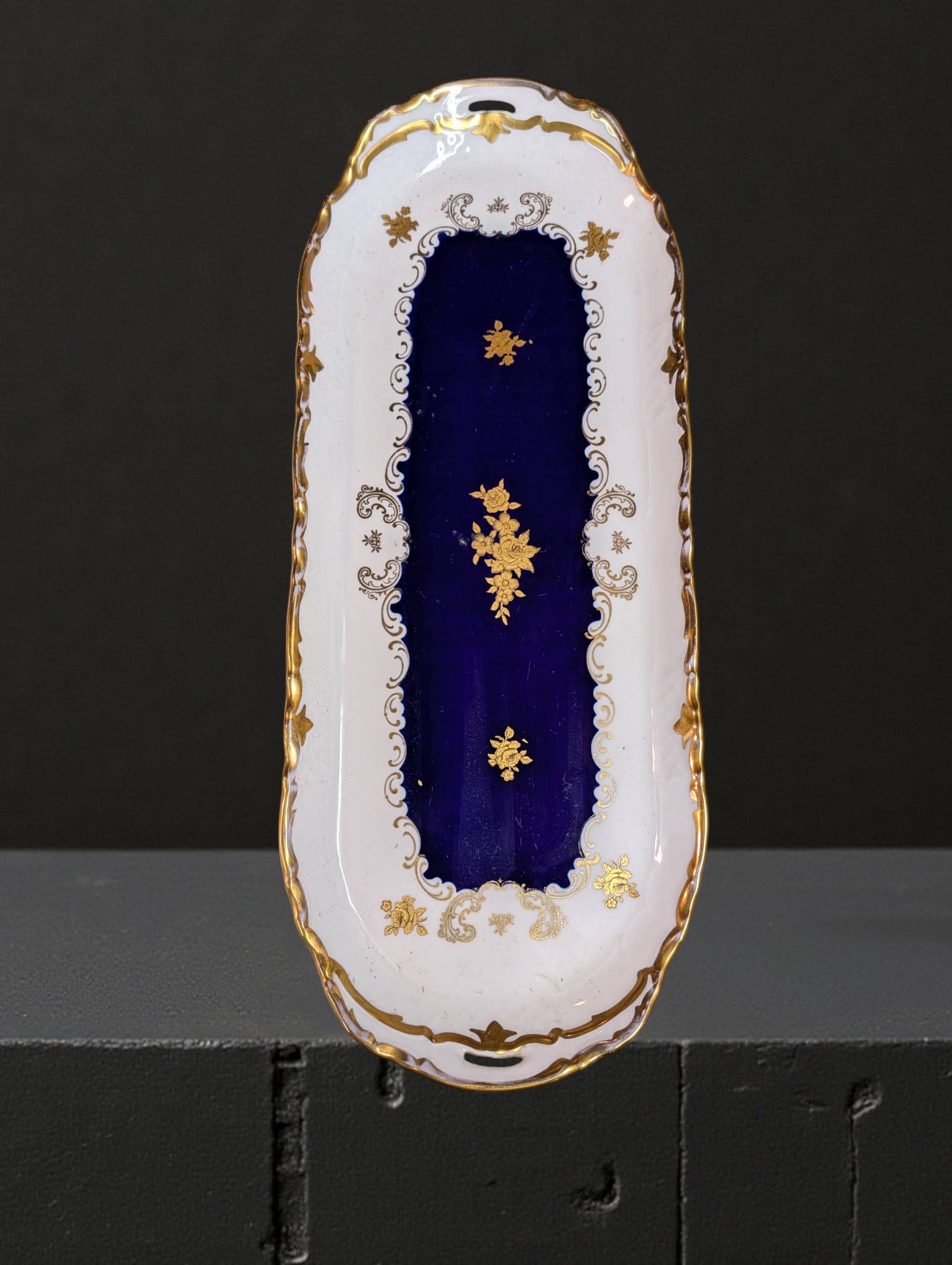 Reichenbach Echt Kobalt Porcelain Serving Tray, GDR, 15.25 Inches: Reichenbach Echt Kobalt porcelain serving tray, marked 'Fine China Made in GDR.' Features a cobalt blue center with white and gold gilt floral pattern, crafted using genuine cobalt pigment. The tray h