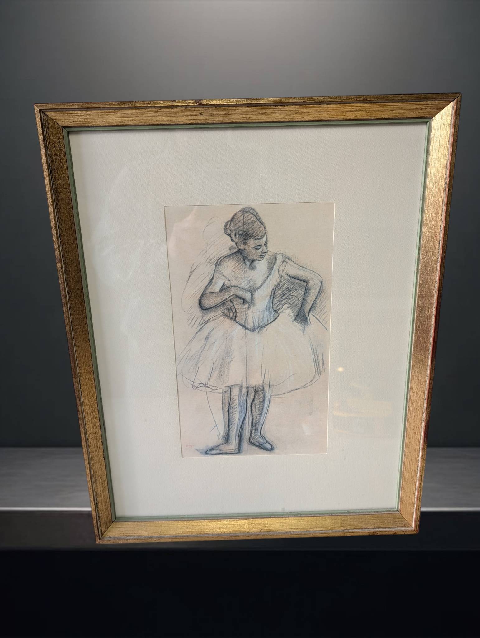 Framed Print of â€˜Ballet Dancerâ€™ by Degas, Charles Slatkin Collection: Framed print of 'Ballet Dancer' by Edgar Degas, originating from the Charles Slatkin Collection. The artwork measures 19 1/2 inches by 15 1/2 inches and depicts a dancer in a tutu. Presented under gla