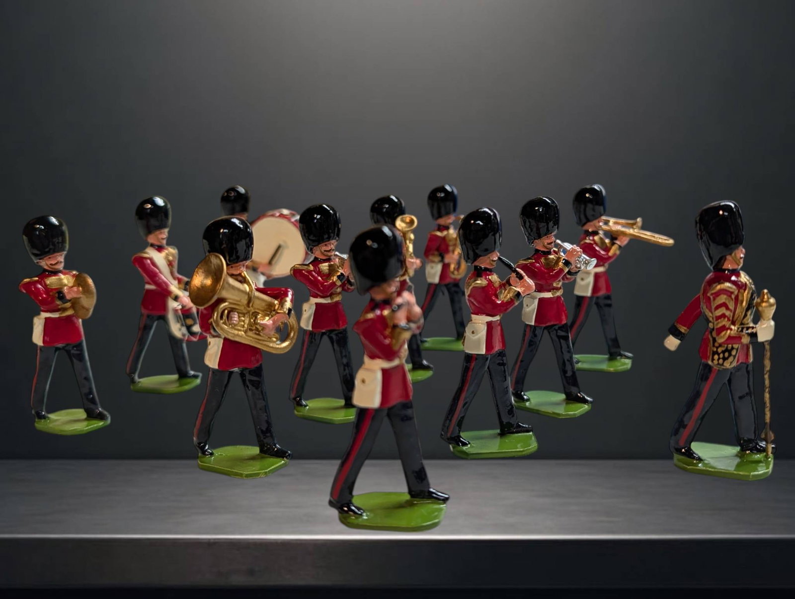 Historically Accurate 54 mm Ducal Military Band Figures, Hand-Painted in England: Historically accurate 54 mm military figures representing a marching band. Manufactured in England by Ducal Models, Fort Ducal, East Lehigh, with each figure cast, assembled, and hand-painted. Include