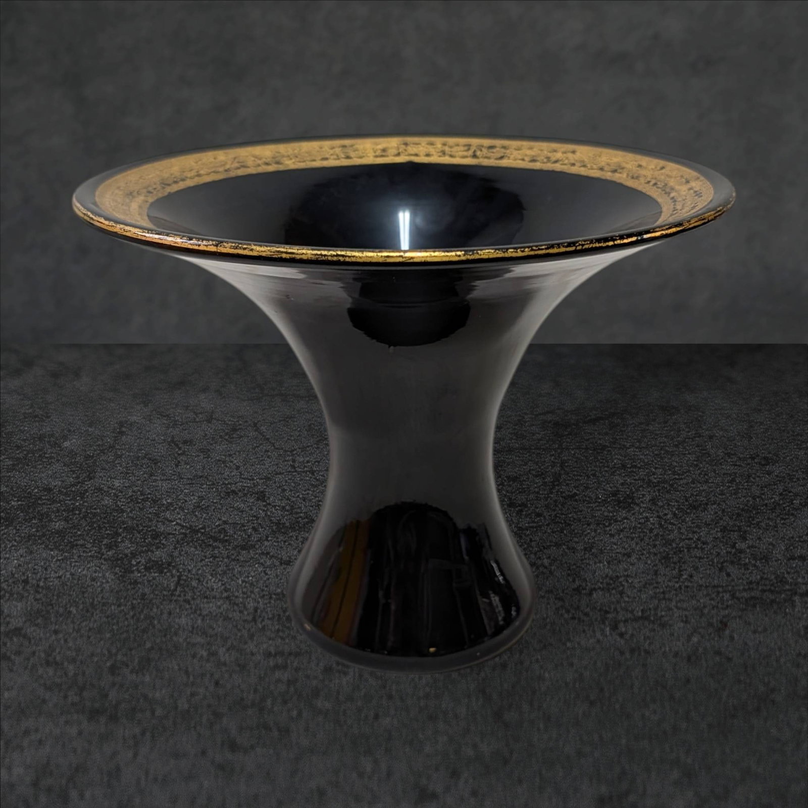 Amethyst Glass Pedestal Bowl with Gold Filigree Rim Details: Decorative amethyst glass pedestal bowl featuring a gold filigree rim design. The top measures approximately 9 3/4 inches in diameter, the bowl stands 7 inches tall, and the base is 4 inches in diamet