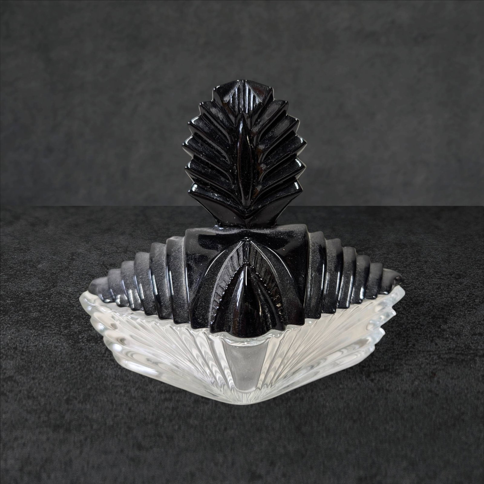 Vintage Martinsville Vanity Trinket Box in Black Amethyst Glass, 1920s: Glass trinket box identified as a Martinsville vanity piece from the 1920s. Composed of black amethyst and clear glass, it features an intricately molded design with a removable lid. Measures approxim