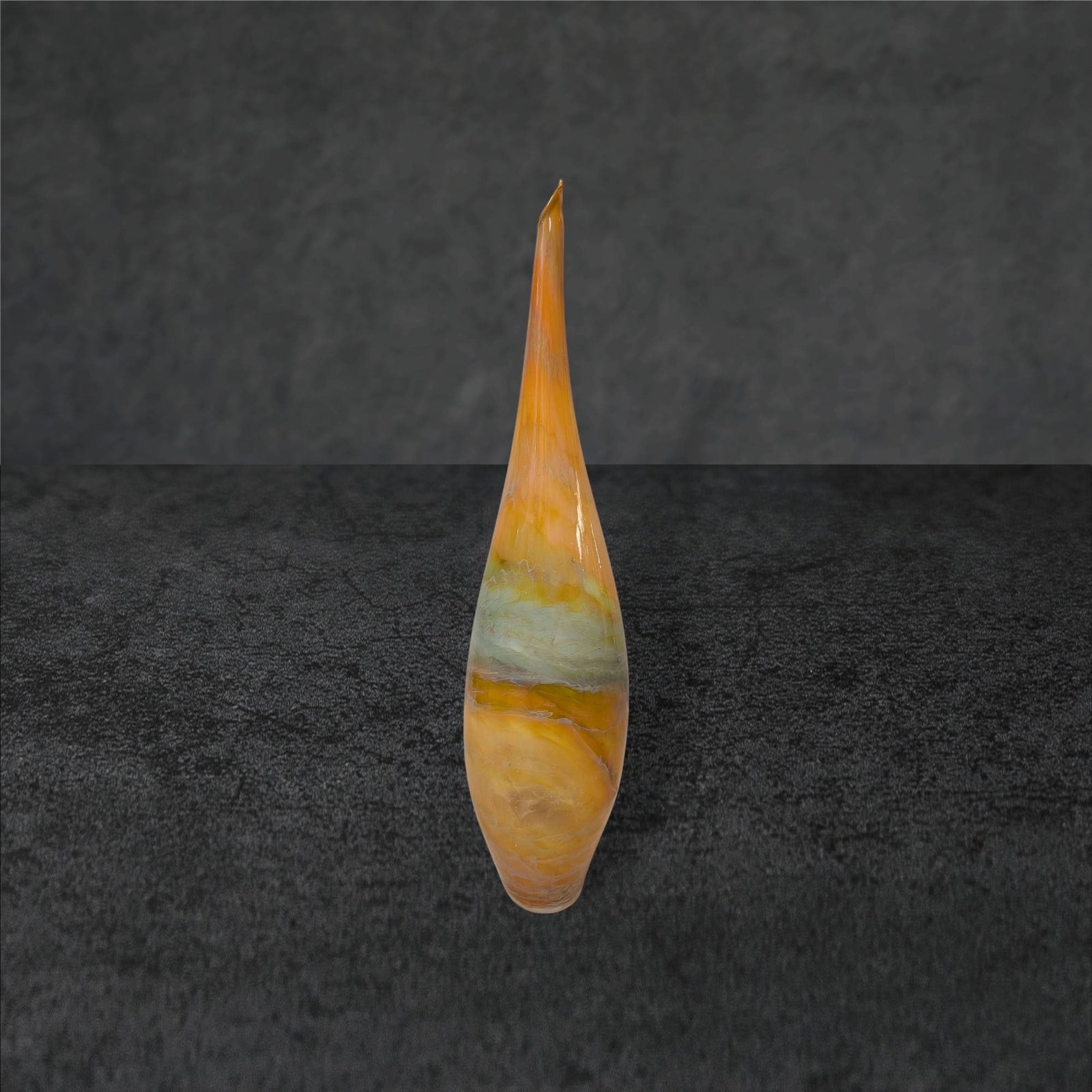 Art Glass Vase with Multicolor Swirl Design, 16 Inches Tall: Blown art glass vase featuring a slender elongated form with a pointed top. Decorated with a multicolor swirl design incorporating shades of orange, yellow, and green. Stands approximately 16 inches t