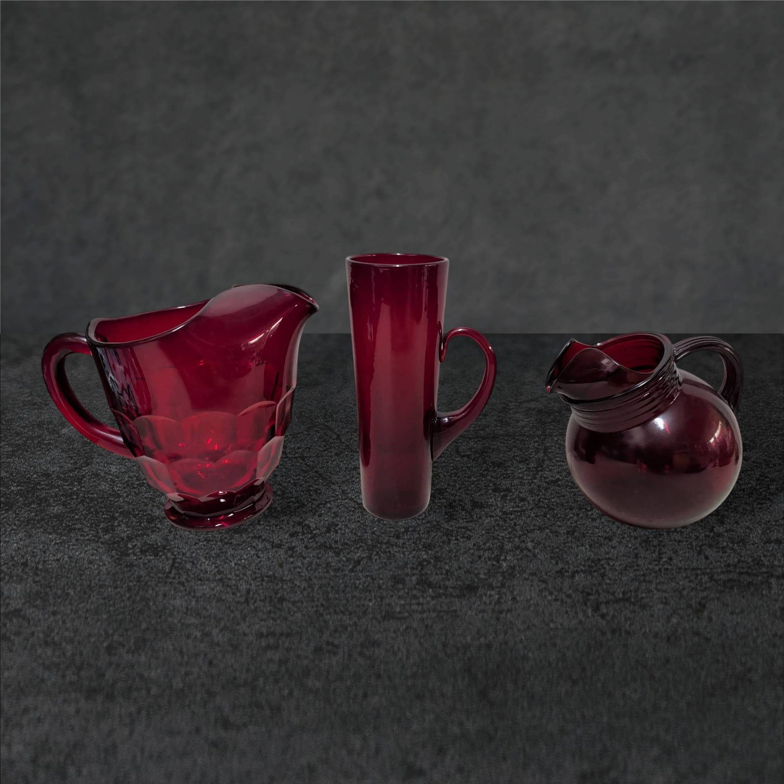 Ruby Red Glassware Set: Deco-Style Pitcher, Honeycomb-Pattern Pitcher, and Tall Glass Vase (1 of 5)