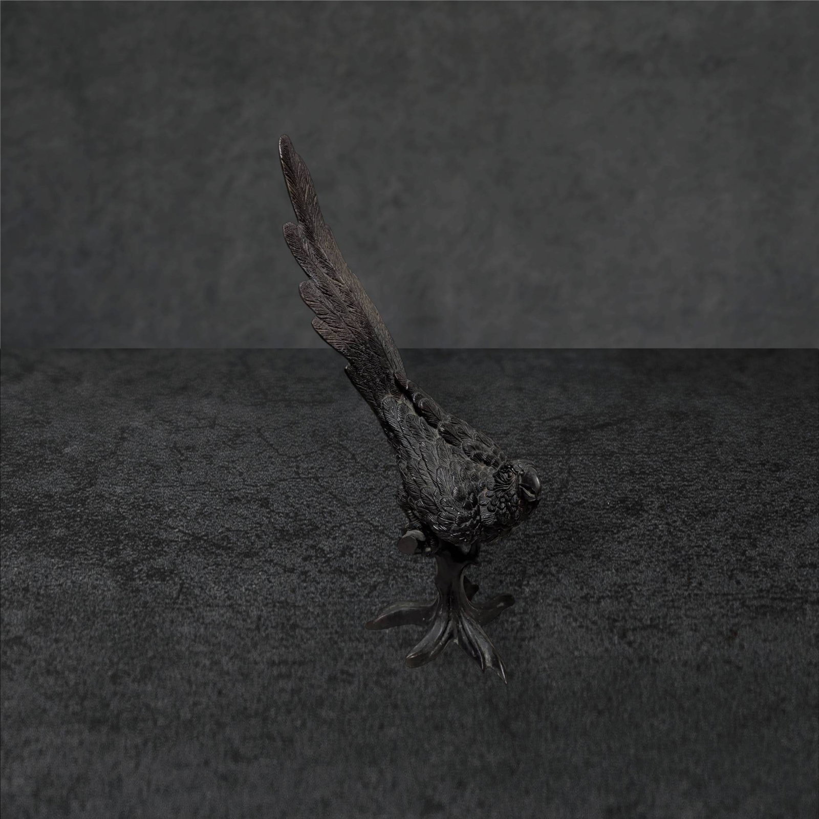 Large Bronze Sculpture of a Parrot Perched on Branch: Large bronze sculpture of a parrot, measuring 26 inches tall from base to tail. The body-to-head height is 20 inches, and the head-to-bottom-of-perch height is 12 inches. Made entirely of bronze with 