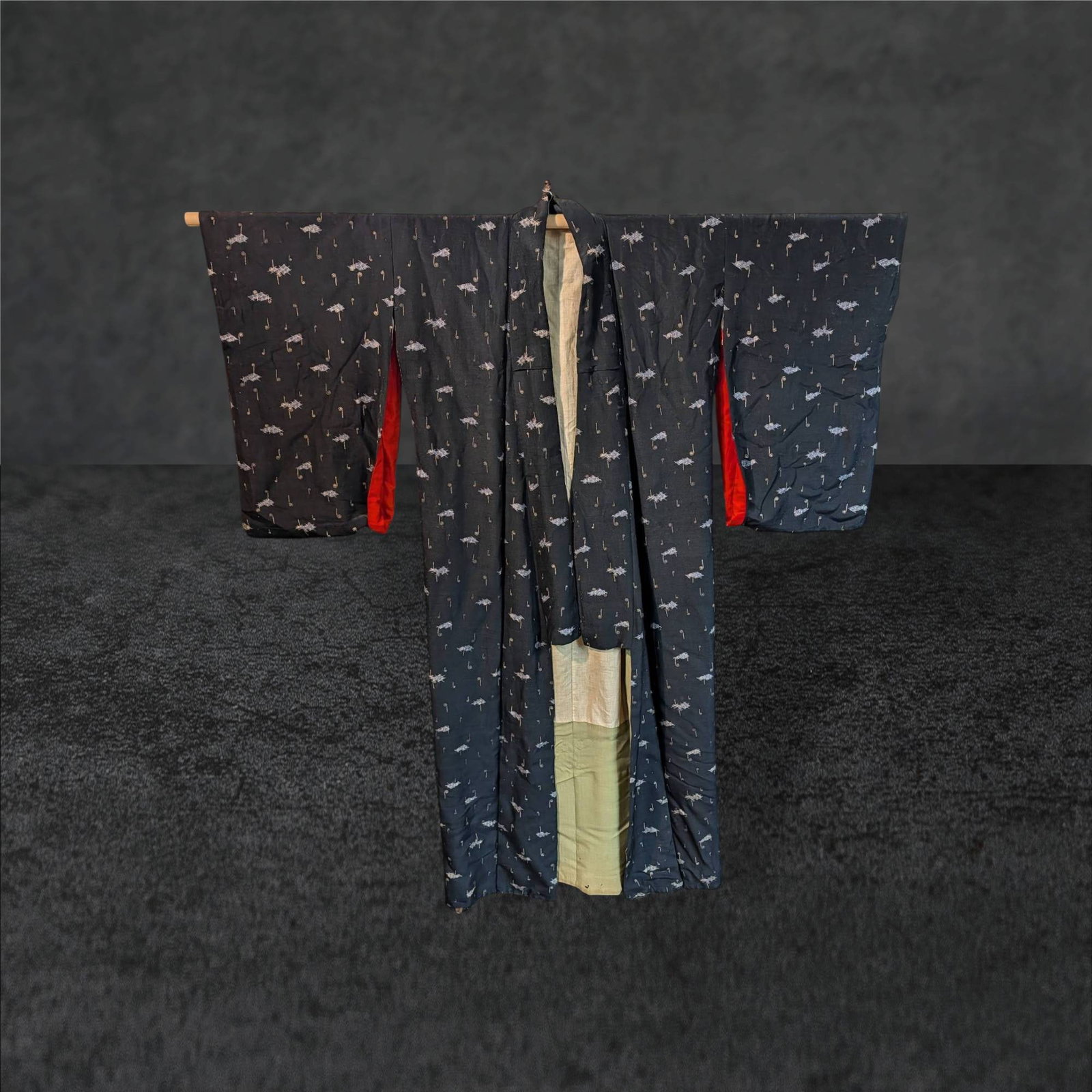 Vintage Black Komodo with Square Pattern and Red Lining (48 in. x 57 in.): Vintage black Komodo featuring a square pattern and red inner lining. Measures approximately 48 inches in width and 57 inches in length. Fabric shows some tattering at the bottom, consistent with age 