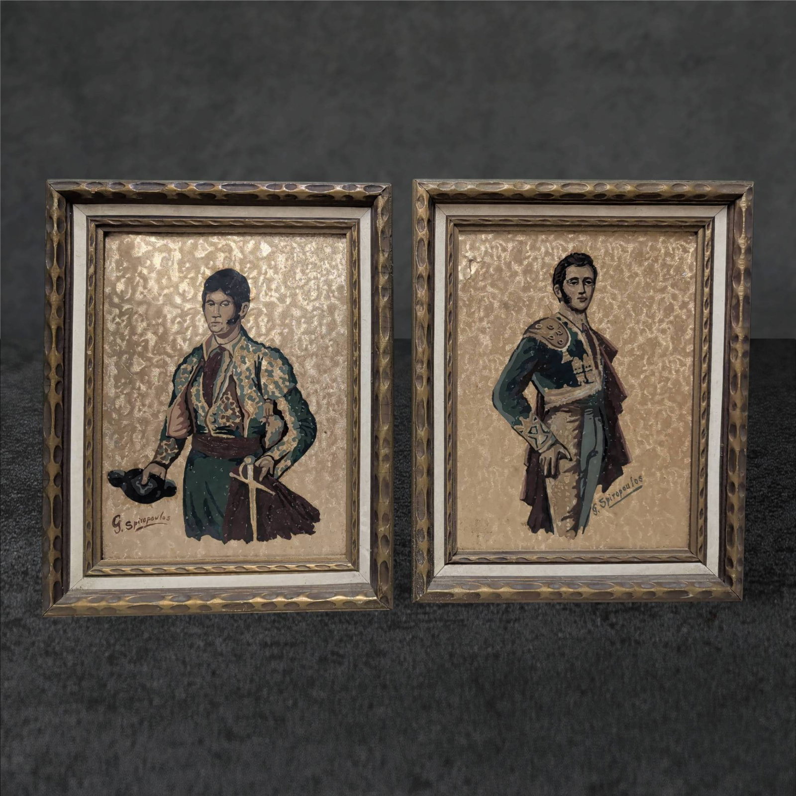 Framed Spanish Bullfighter Paintings, Signed by G. Sanjulian, 20 x 16 Inches: Two framed paintings depicting Spanish bullfighters, signed by the artist G. Sanjulian. Each painting measures 20 inches by 16 inches and features detailed depictions of bullfighters in traditional at