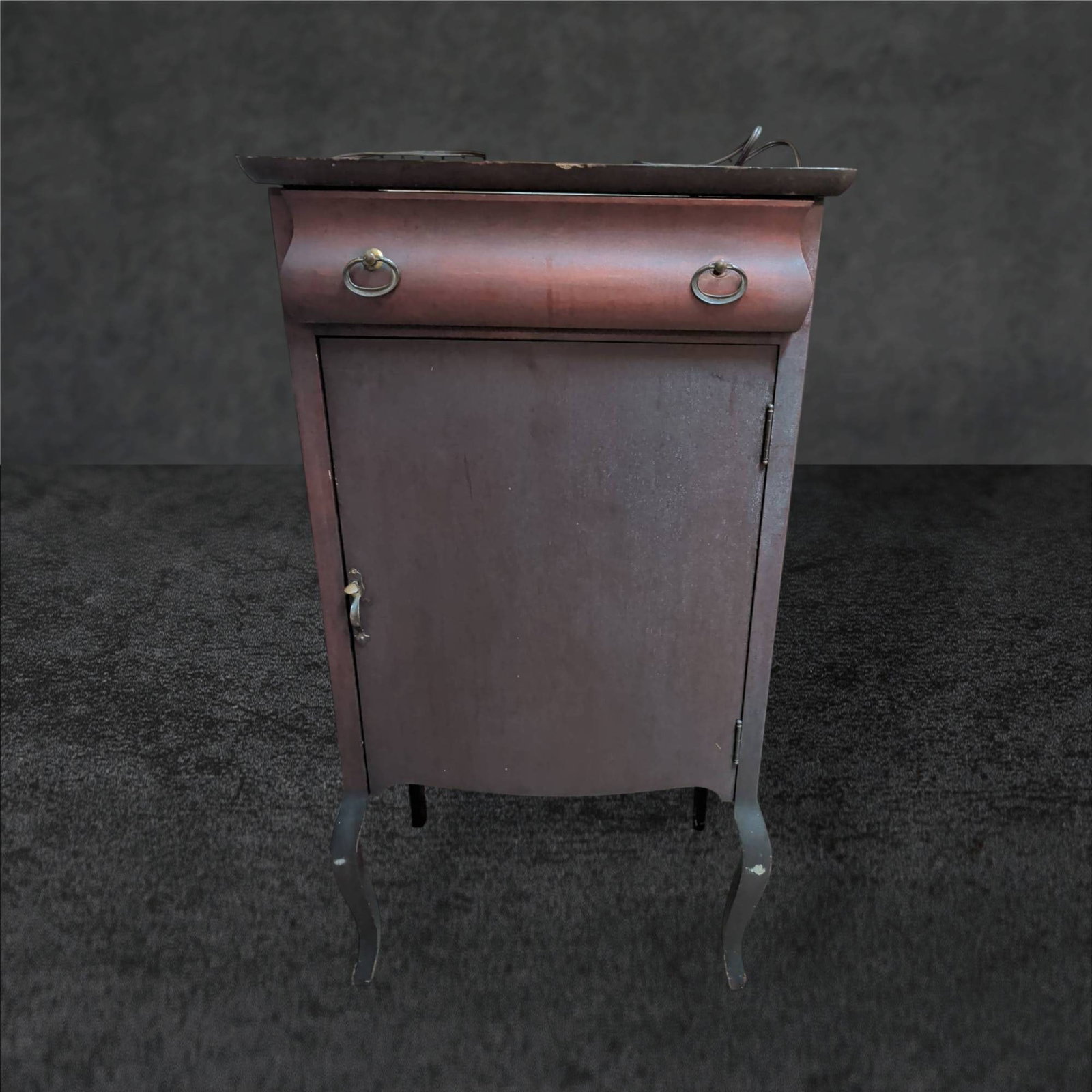 Victorian Era Turn of the Century Style Sheet Music Cabinet with Single Door and Drawer: Wooden sheet music cabinet in Victorian turn-of-the-century style, measuring approximately 37 in tall by 20 in wide by 14 in deep. Features a single hinged door with an interior compartment and a draw