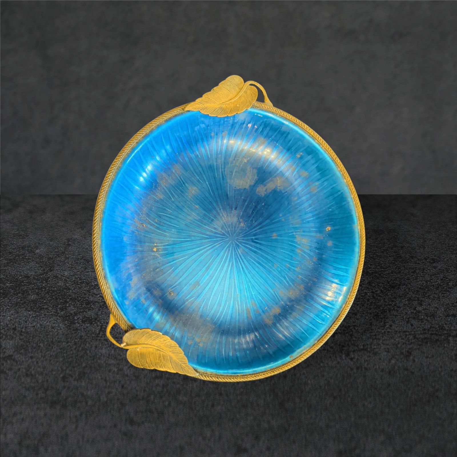 Vintage Evans Enamel Leaf Dish in Cobalt Blue, 6.5-inch Diameter: Vintage dish by Evans featuring a cobalt blue enameled surface. Designed with a leaf-shaped rim accent. Measures 6.5 inches in diameter. The enamel exhibits visible wear and age-related discoloration,