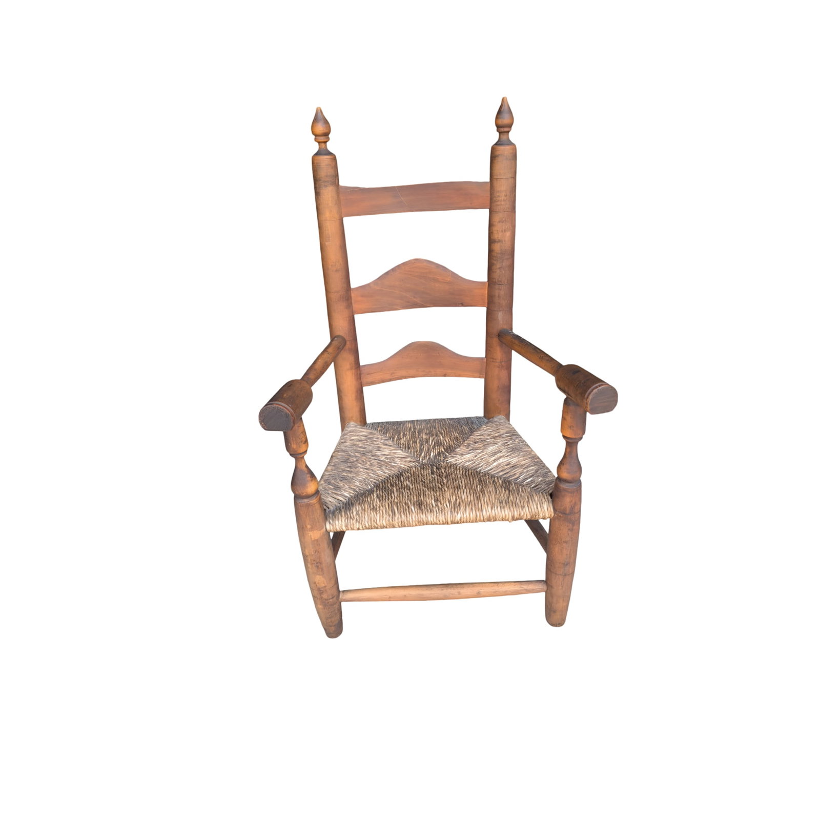 Antique Early American Style Child's Ladder Back Armchair with Woven Rush Seat: Early American style child's ladder back armchair featuring a three-slat arched horizontal backrest, turned wooden finials, and rounded armrests. Seat is constructed with natural rush woven in a four-