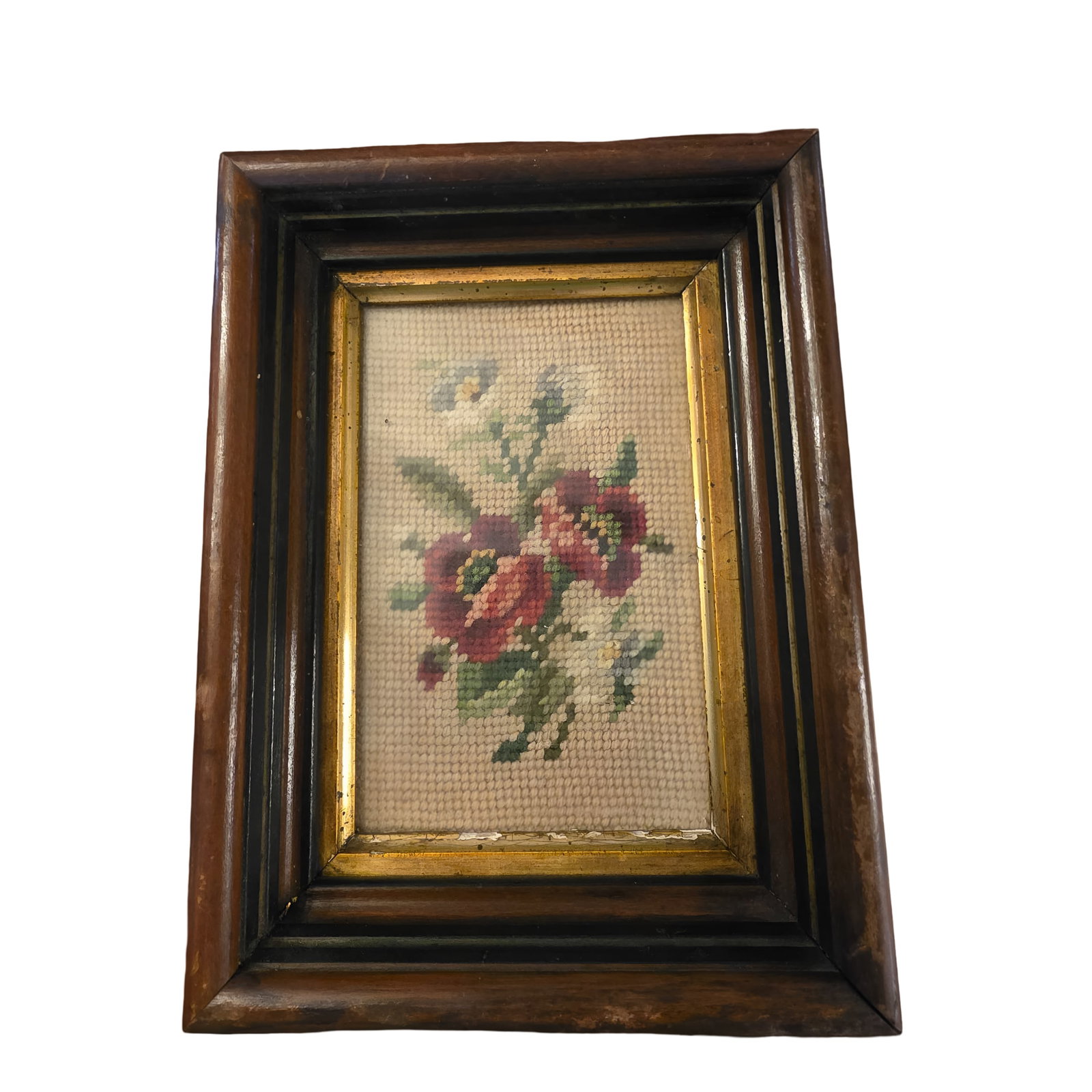 Vintage Floral Needlepoint Embroidery with Dark Brown Wooden Frame with Gold Inner Trim: A small floral needlepoint embroidery depicting red and white flowers with green leaves, mounted in a wooden frame with a gilt inner border. The frame features a layered wood design and a hanging