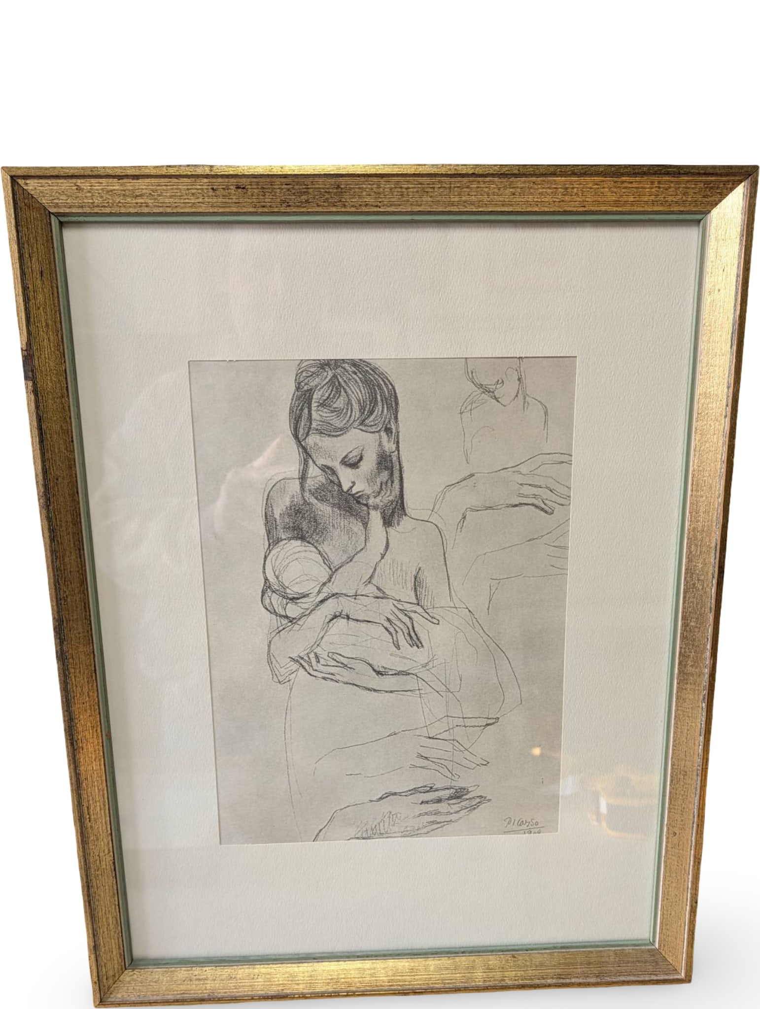 Framed Print, â€˜Mother and Child and Four Studies for a Right Handâ€™ by Picasso: Framed artwork titled 'Mother and Child and Four Studies for a Right Hand' attributed to Picasso. Measures 19.5 x 15.5 inches and features a printed depiction of a mother and child alongside hand stud