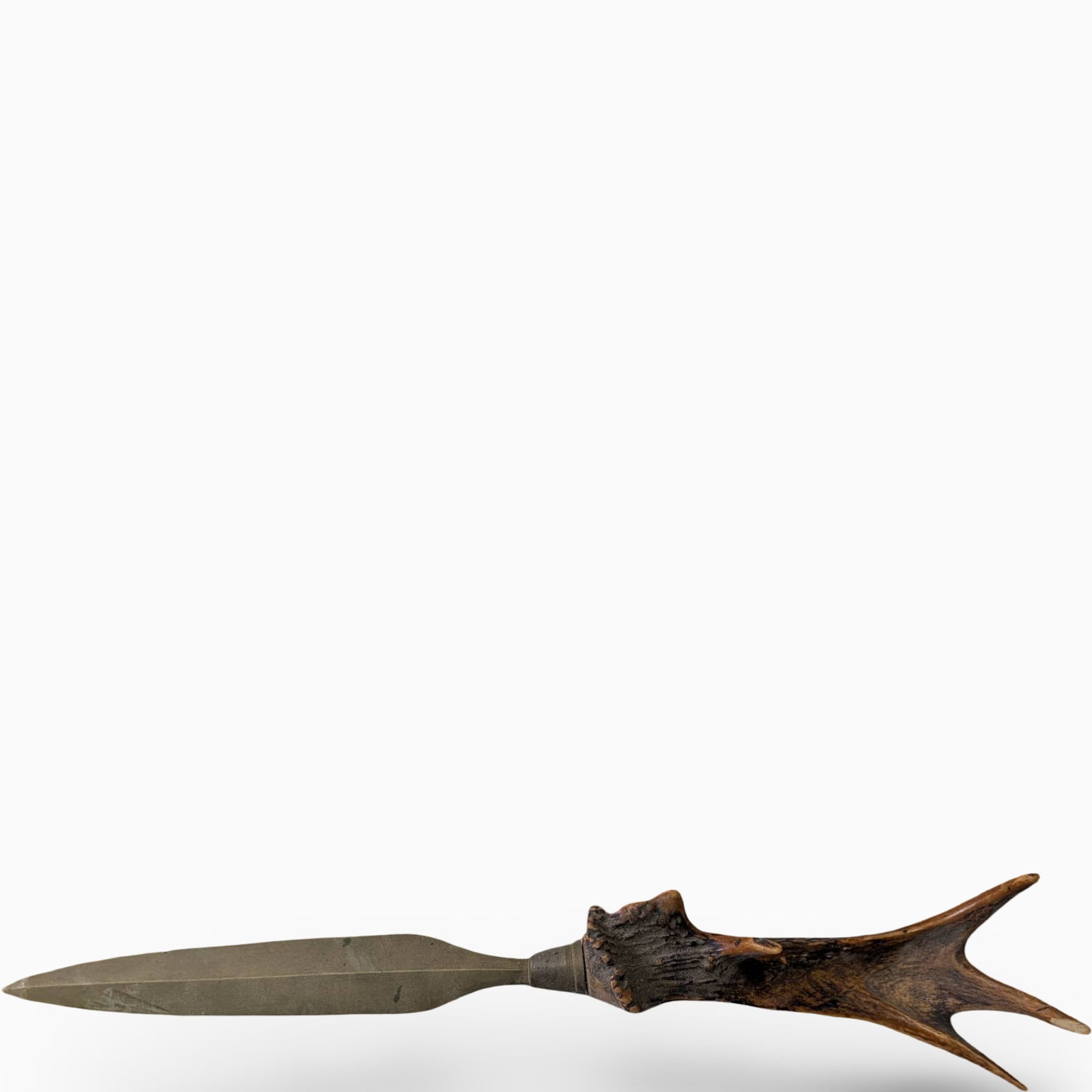 Brass Antler Letter Opener, 16 Inches Long: Letter opener featuring a brass blade measuring 16 inches in total length. The handle is crafted from an authentic antler, providing a textured and natural grip. The brass blade tapers to a fine point