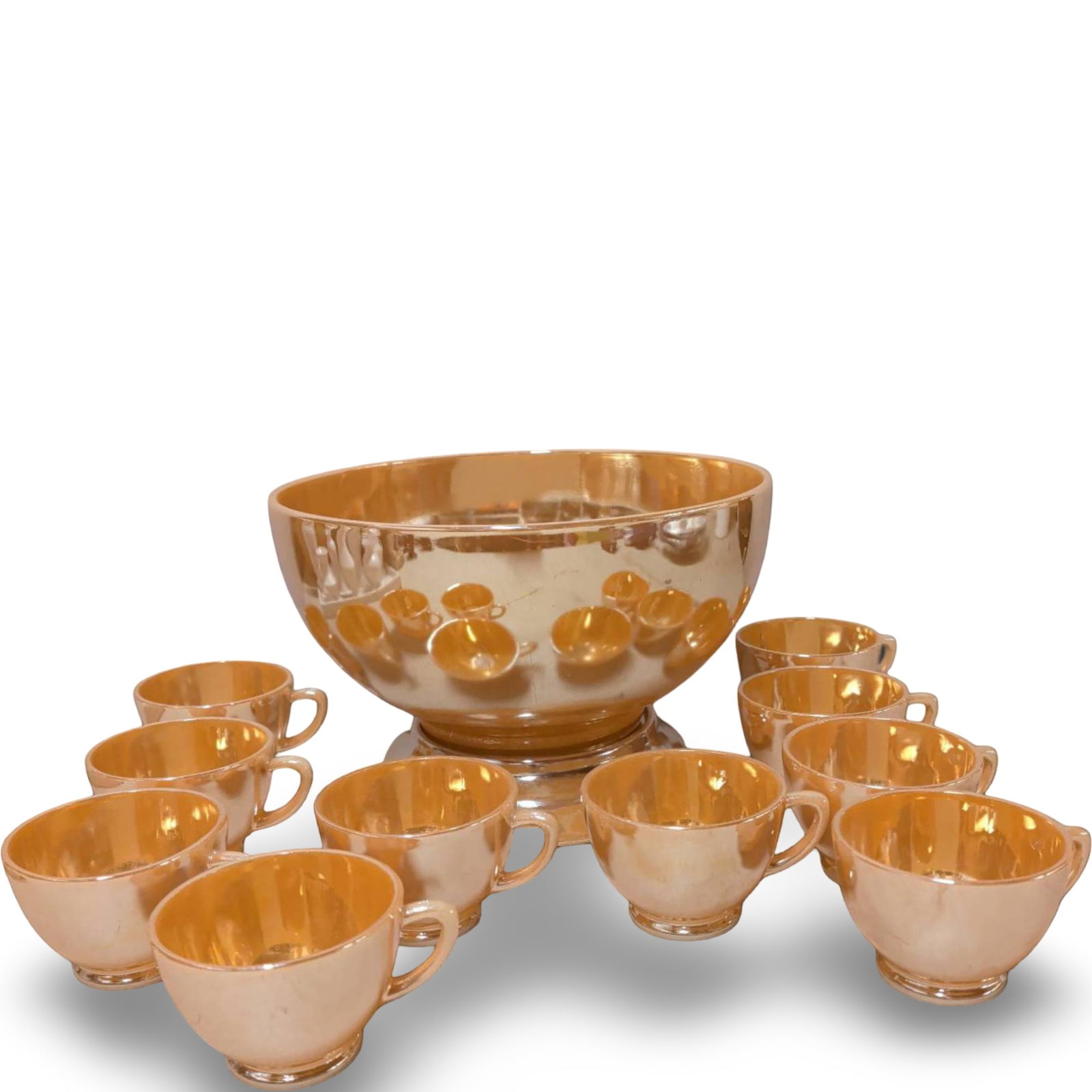 Vintage Carnival Glass Punch Bowl Set with 10 Cups: Vintage carnival glass punch set with lusterware finish. Includes one punch bowl measuring 10 inches in diameter and 7 inches tall, accompanied by 10 matching cups, each 3 1/4 inches in diameter and 2