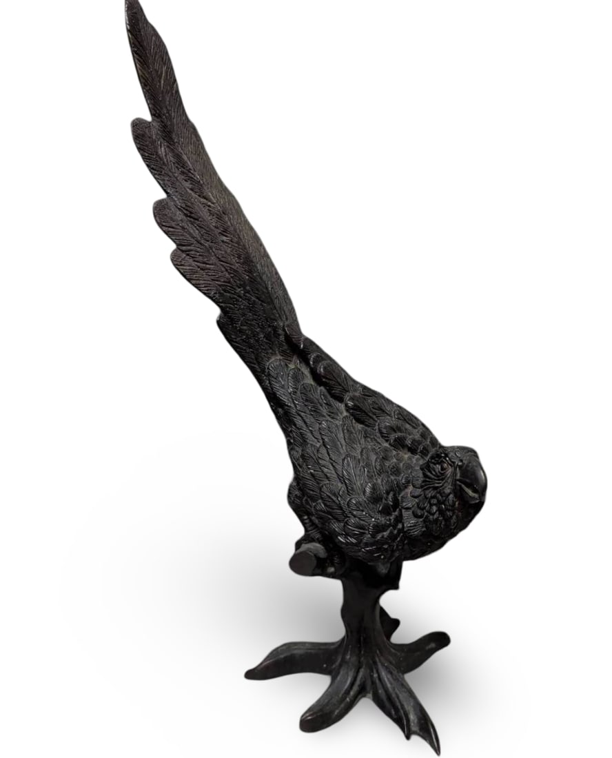 Large Bronze Sculpture of a Parrot Perched on Branch: Large bronze sculpture of a parrot, measuring 26 inches tall from base to tail. The body-to-head height is 20 inches, and the head-to-bottom-of-perch height is 12 inches. Made entirely of bronze with 