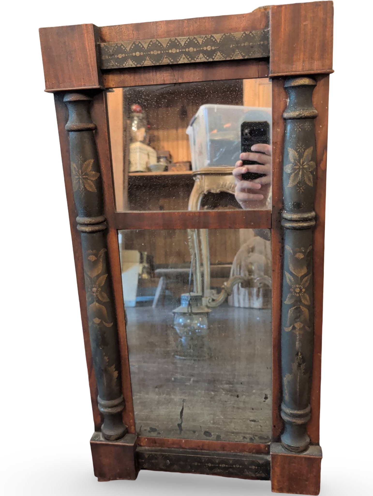 Wall Mirror with Painted Wooden Frame and Decorative Columns, 14 1/2 x 27 1/2 in: Rectangular wall mirror featuring a wooden frame with painted decorative designs, including floral motifs on its side columns. The mirror is divided into two sections, with the upper panel framed sepa
