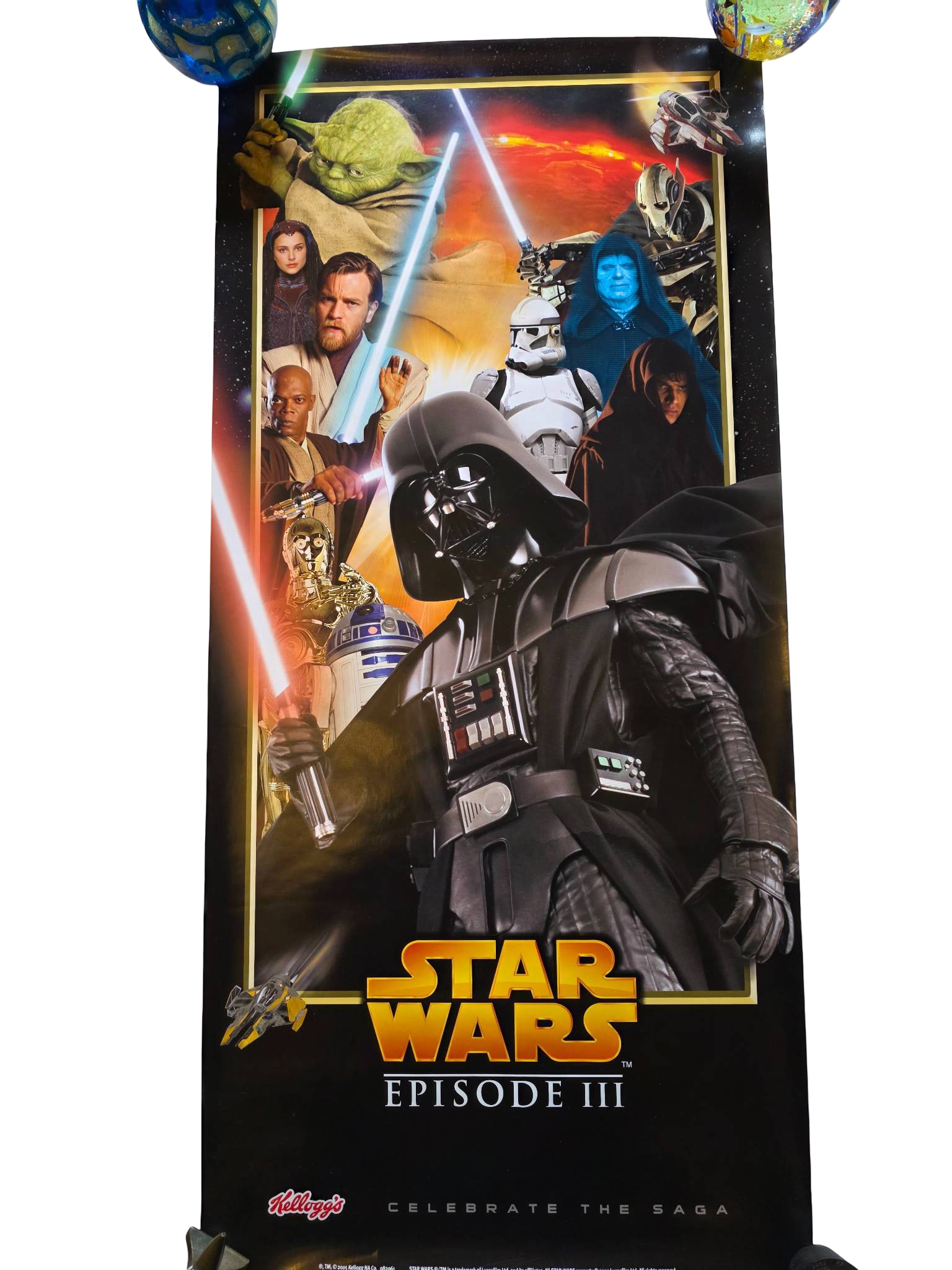 Star Wars Episode III Promotional Poster by Kellogg’s, 2005: Official promotional poster for ‘Star Wars Episode III: Revenge of the Sith’ by Kellogg’s, 2005. The design features Darth Vader prominently with supporting characters from the film and the