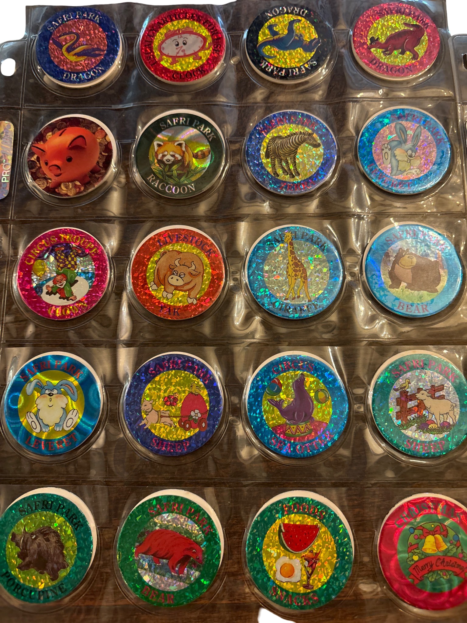 Holographic Animal-Themed Pogs in Plastic Sleeves (1 of 3)