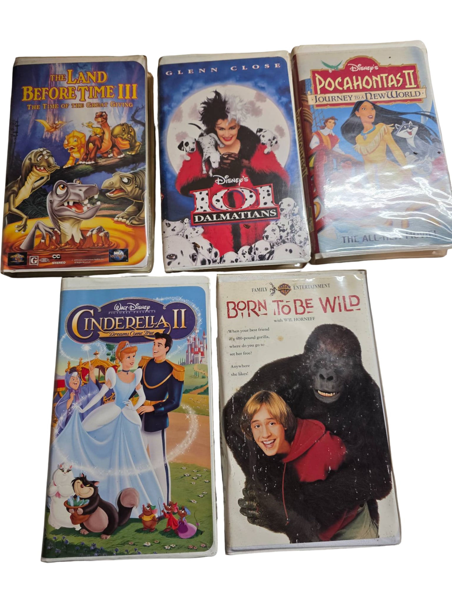 5 VHS Tapes: Disney Classics and More: Five VHS tapes including Disney’s ‘The Land Before Time III,’ ‘101 Dalmatians’ (live-action), ‘Pocahontas II: Journey to a New World,’ ‘Cinderella II,’ and Warner Bros.’ ‘Born