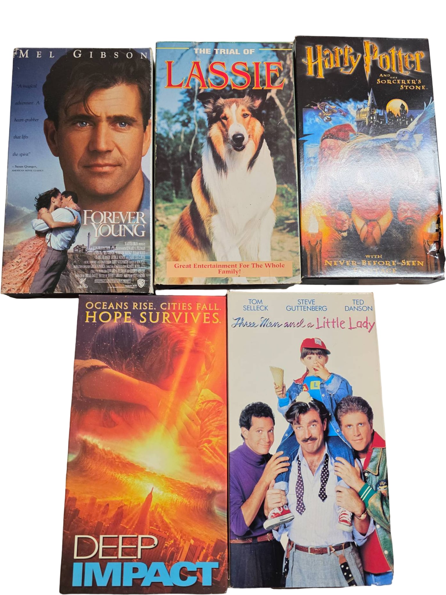 Five VHS Movie Tapes Featuring Family and Action Titles (1 of 3)