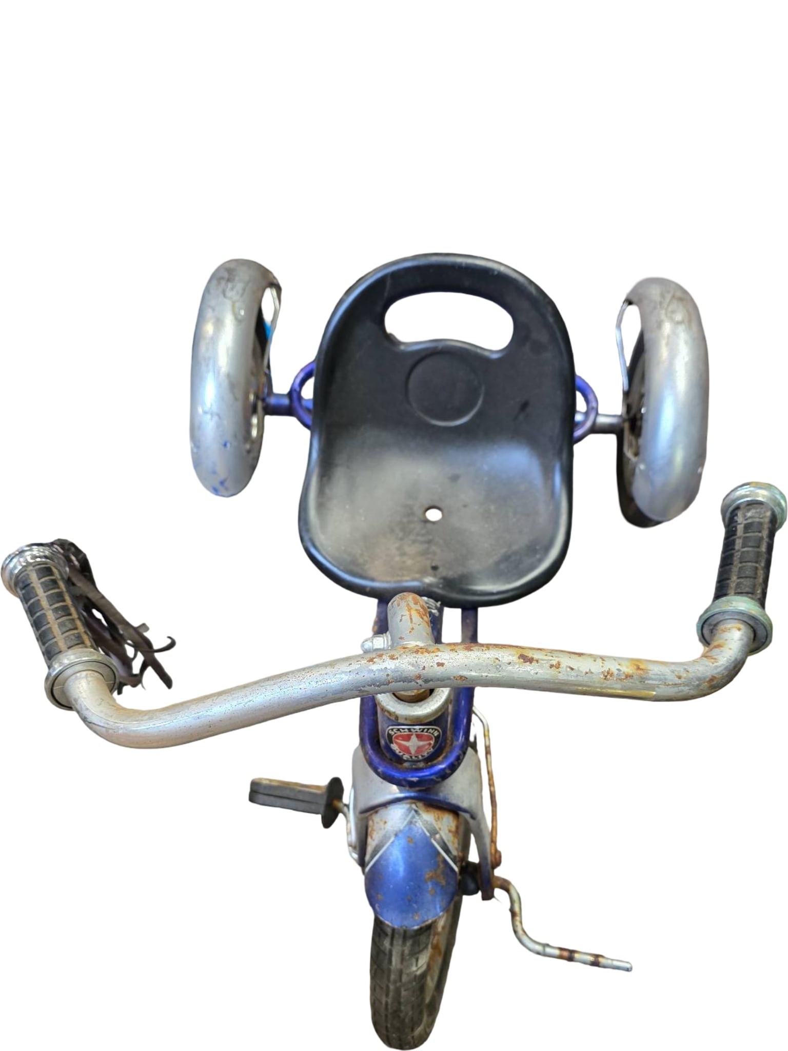 Vintage Child’s Tricycle with Metal Frame and Plastic Seat: Child's tricycle featuring a metal frame in blue with silver-tone rear wheels and a black plastic seat. Front wheel includes a fender and badge detail. The handlebars exhibit wear and patina, with