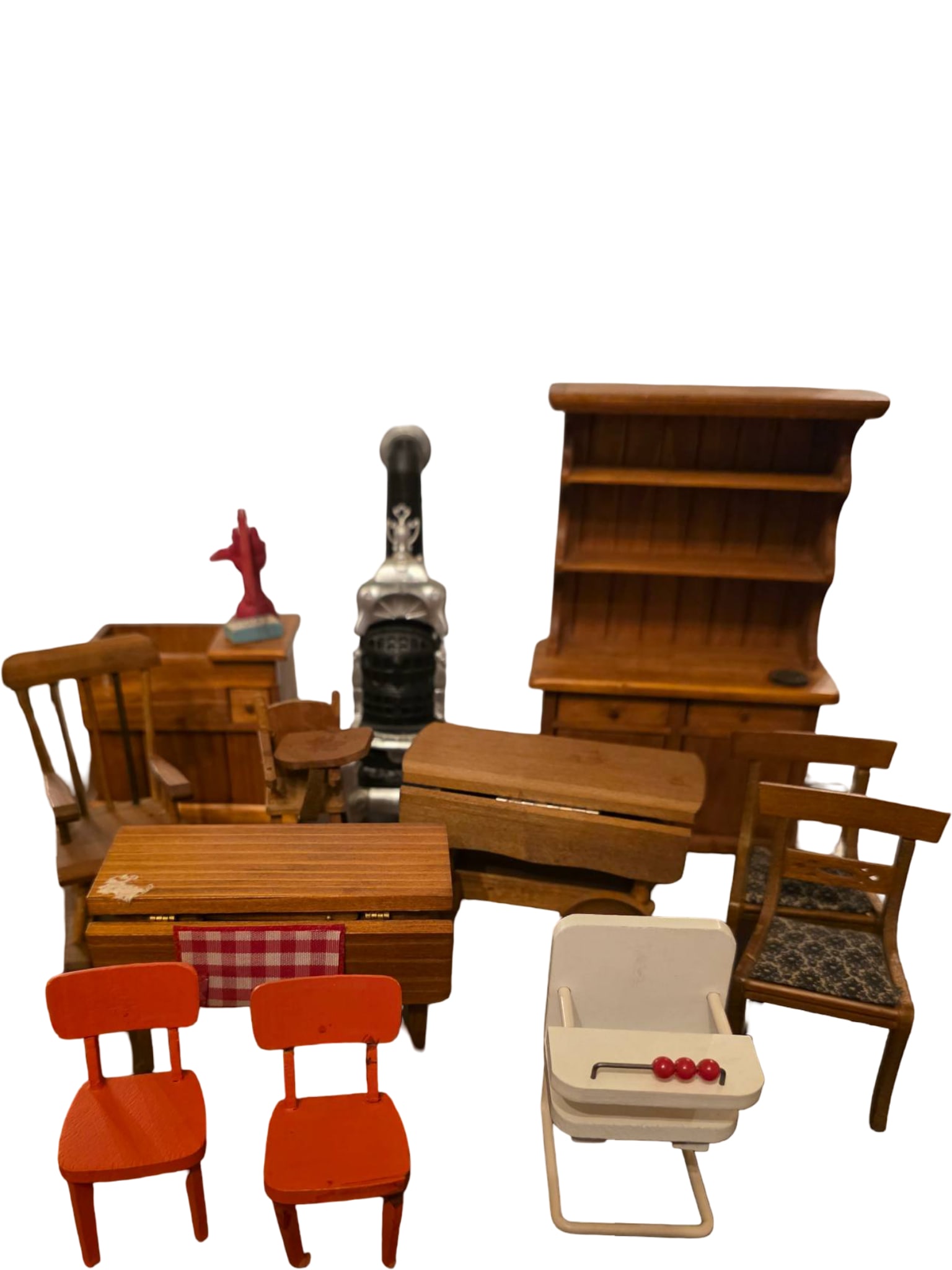 Miniature Wooden Furniture and Accessories for Dollhouses: Miniature dollhouse furniture including a dining table with red checkered cloth, two red chairs, a white high chair with abacus detail, rocking chair, wooden stove, hutch with shelving, and other asso