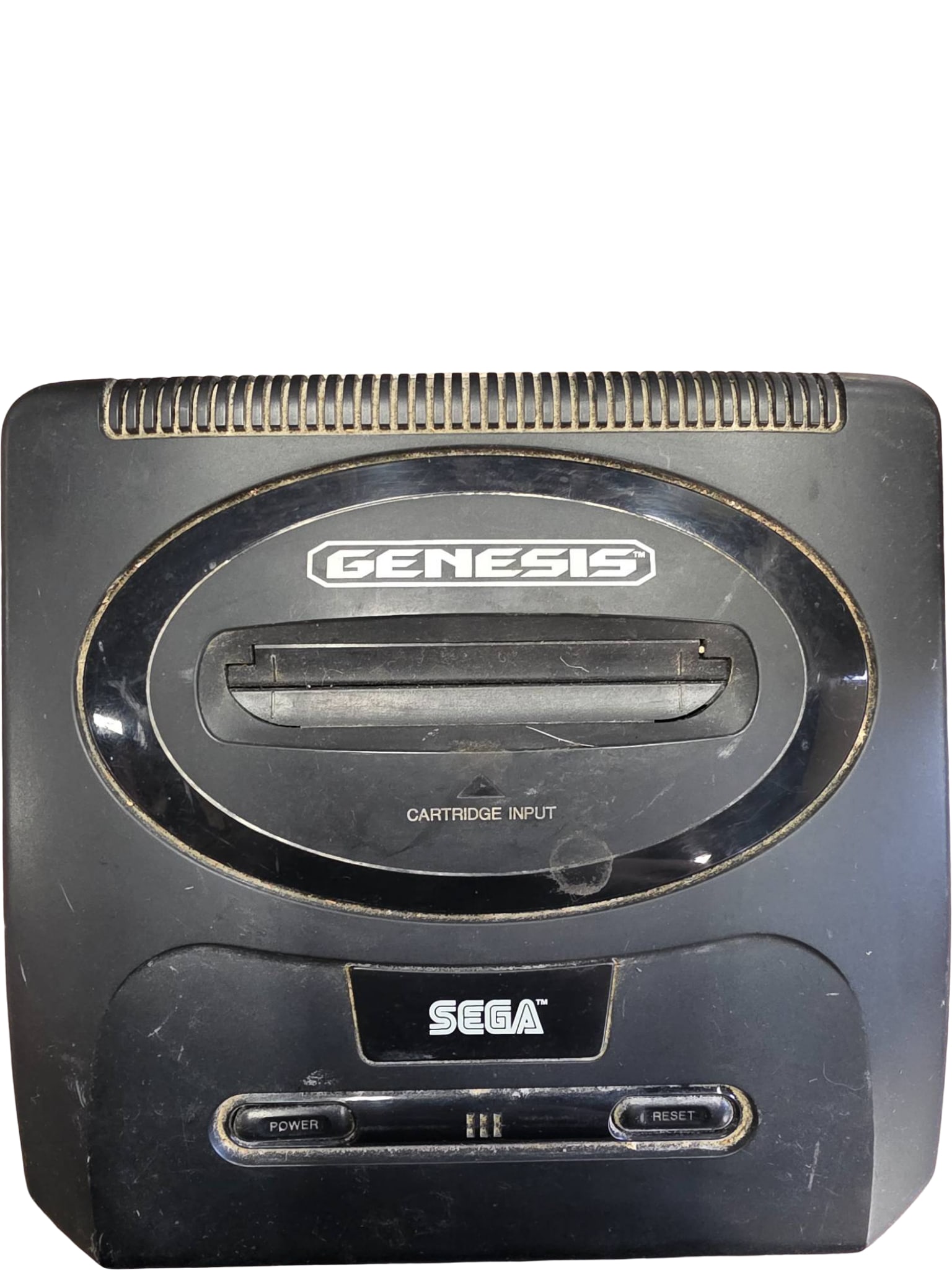 Sega Genesis Console, Model 1601 with Cartridge Input: Sega Genesis video game console, model 1601, featuring a front cartridge input and two-button control panel with power and reset options. Includes FCC and manufacturer's labels on the underside. Shows