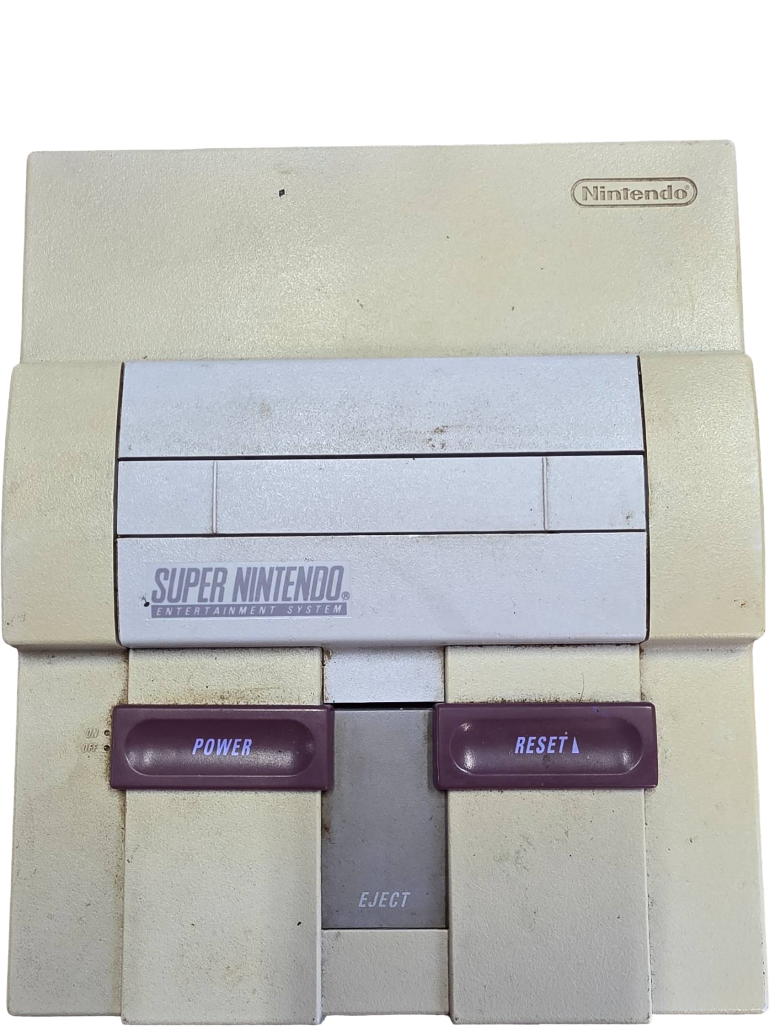 Super Nintendo Entertainment System (SNES) Console: Nintendo Super Nintendo Entertainment System (SNES) console, model SNS-001, featuring Power and Reset buttons and cartridge slot. Known for its 16-bit graphics, this console was originally released in