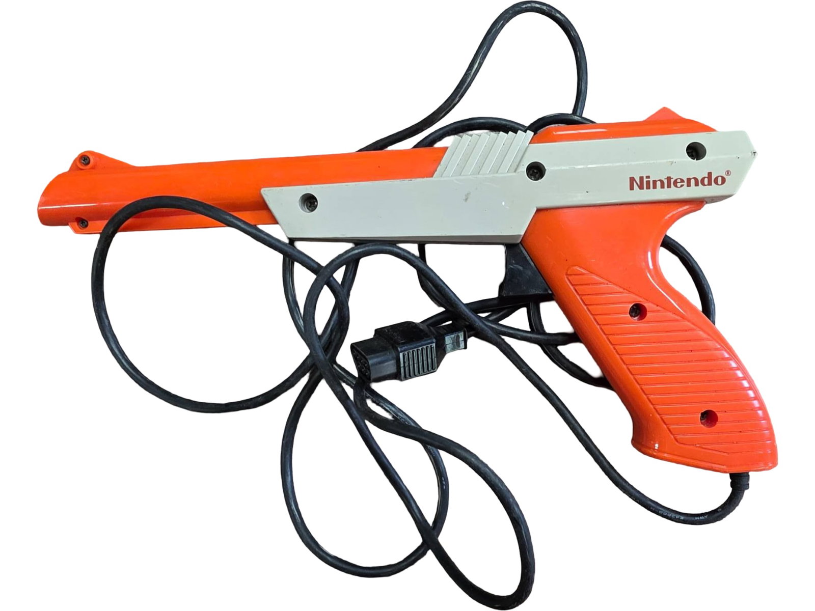 Nintendo NES Zapper Light Gun for Duck Hunt and Compatible Games: Nintendo NES Zapper light gun controller in orange and gray plastic. Compatible with the original Nintendo Entertainment System and games like Duck Hunt. Features a wired connection and trigger
