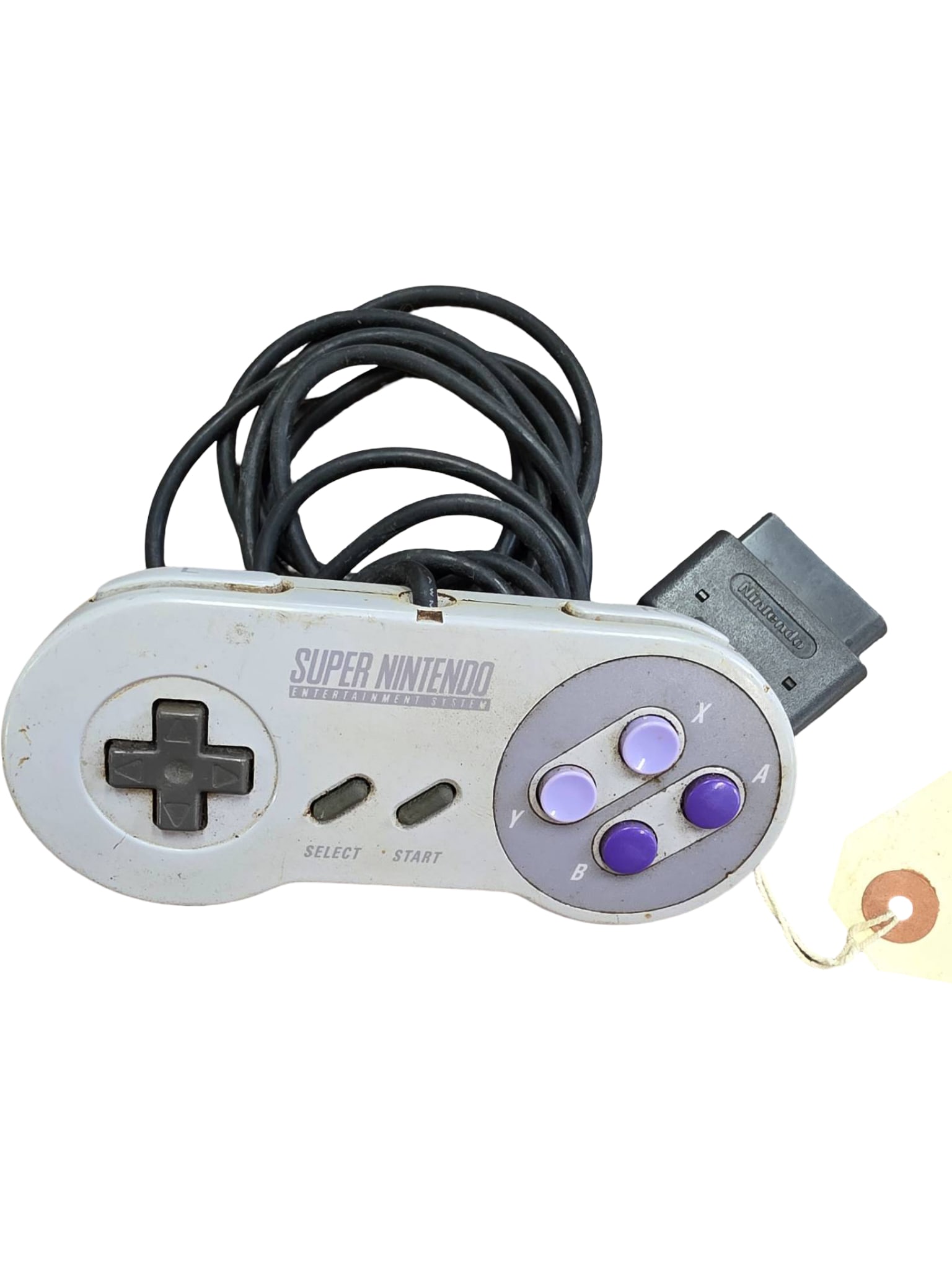 Nintendo Super Nintendo Entertainment System (SNES) Controller: A Nintendo Super Nintendo Entertainment System (SNES) controller featuring a gray plastic body with a directional pad, start/select buttons, and purple-toned action buttons (A, B, X, Y). The