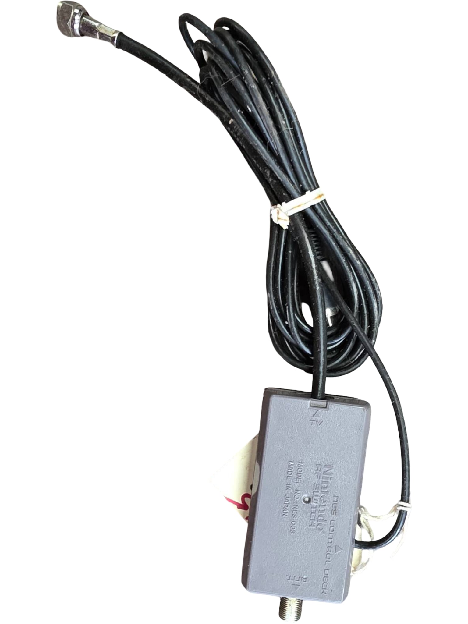 Nintendo RF Switch Model No. NES-003, Made in Japan: Nintendo RF Switch, Model No. NES-003, manufactured in Japan. Designed for use with Nintendo Entertainment System (NES) consoles to connect to a television. The switch includes a coaxial cable and con