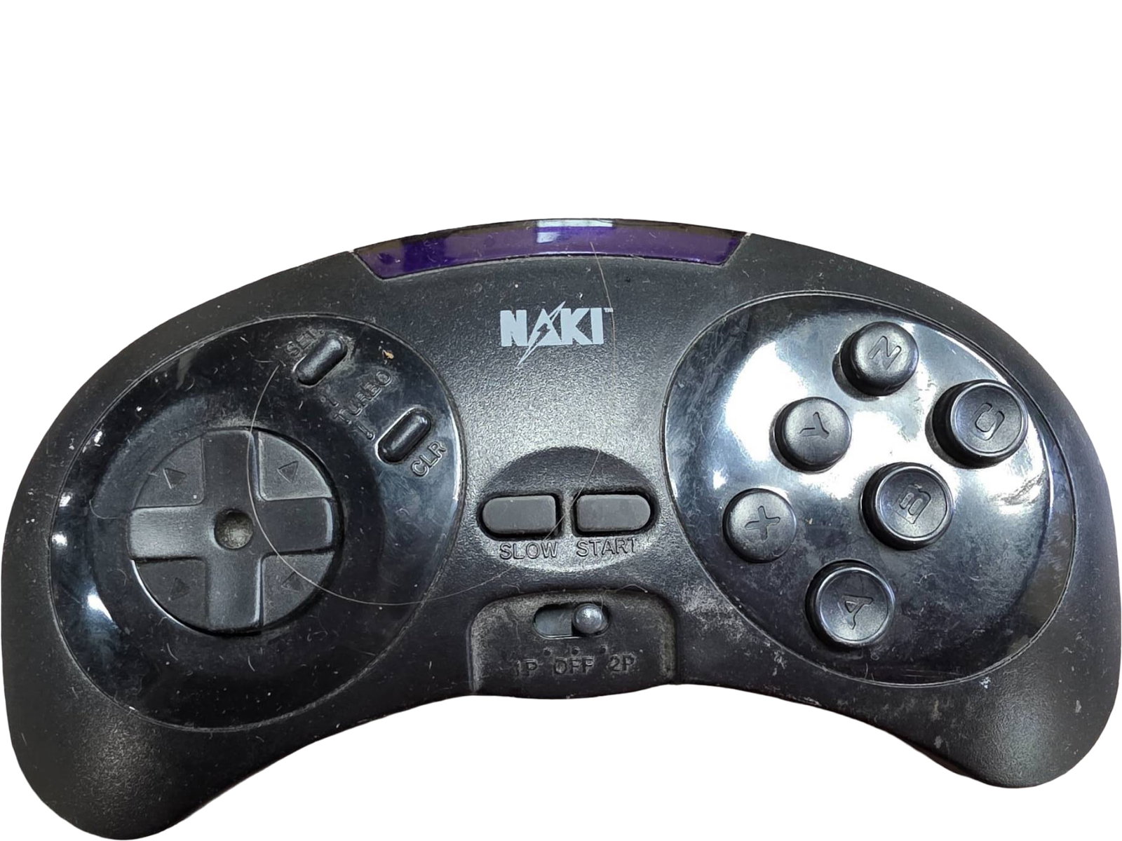 Maxi Wireless Gaming Controller: Maxi-branded wireless gaming controller constructed of black plastic with a curved ergonomic design. Features a directional pad, four main action buttons, and additional center buttons. The back inclu