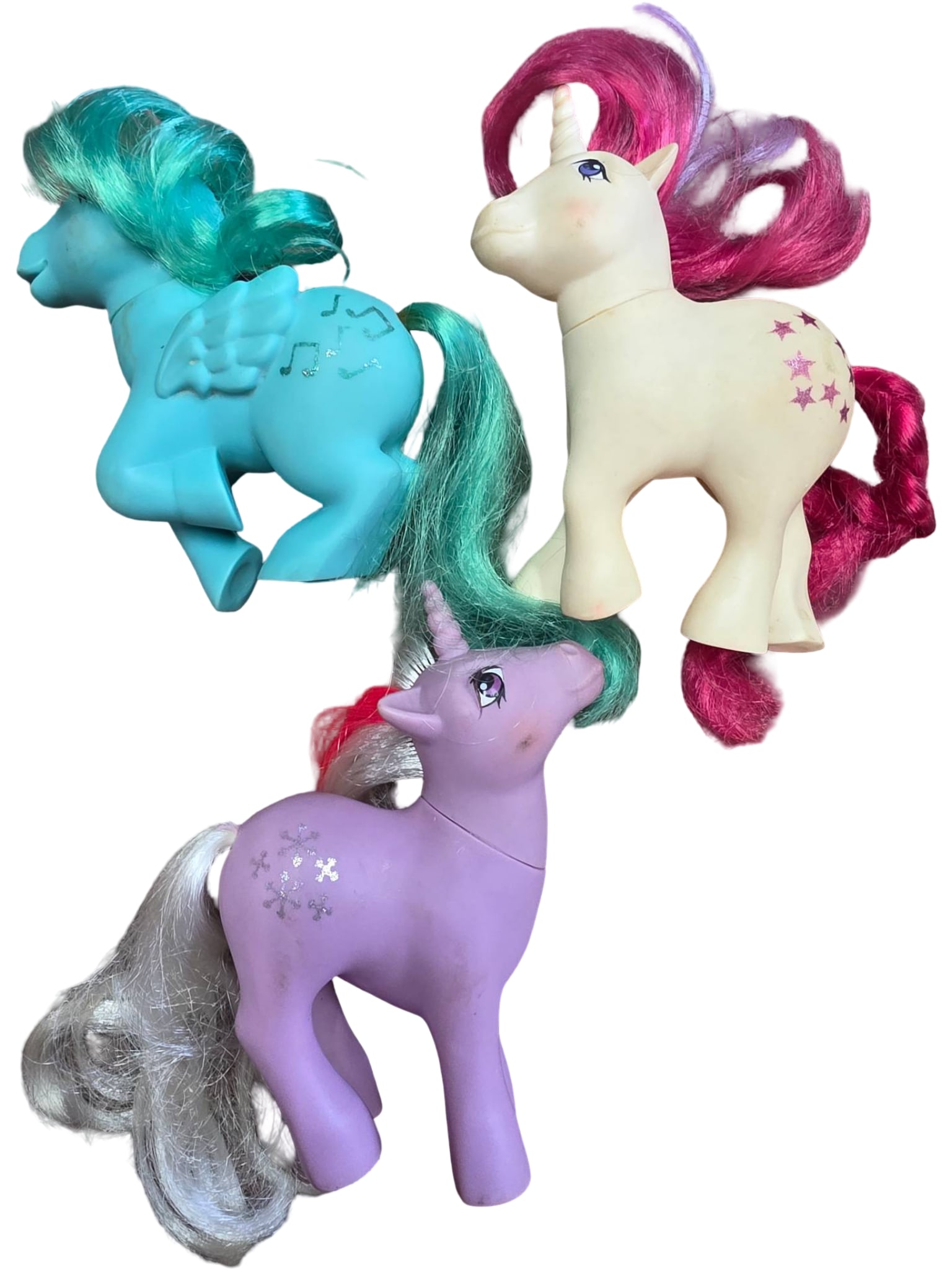 Three Hasbro My Little Pony Figures with Unicorn Designs: Three Hasbro My Little Pony figures, each featuring a unicorn theme. Includes Medley, Powder and Moondancer. Made of molded plastic with synthetic hair. Each shows light wear consistent with handling 