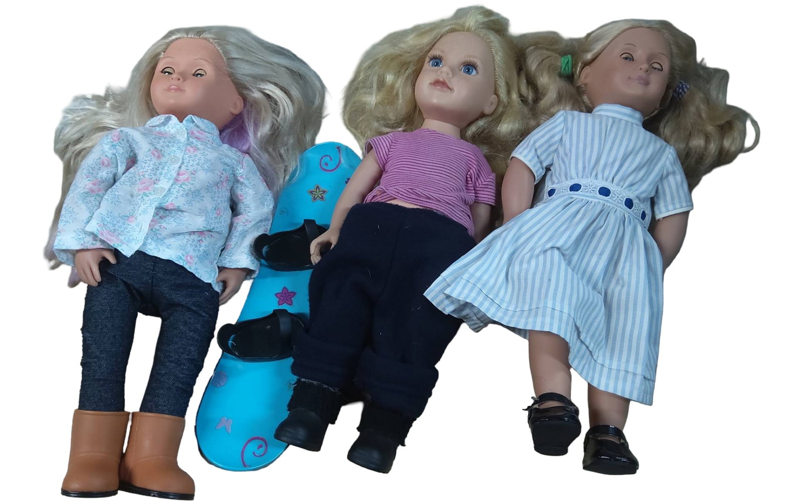 Three 18-Inch Dolls with Outfits and Accessories: Three 18-inch dolls with rooted hair, articulated limbs, and detailed clothing. Outfits consist of a blouse with pants and boots, a short-sleeved top with pants and boots, and a dress with shoes. Acce